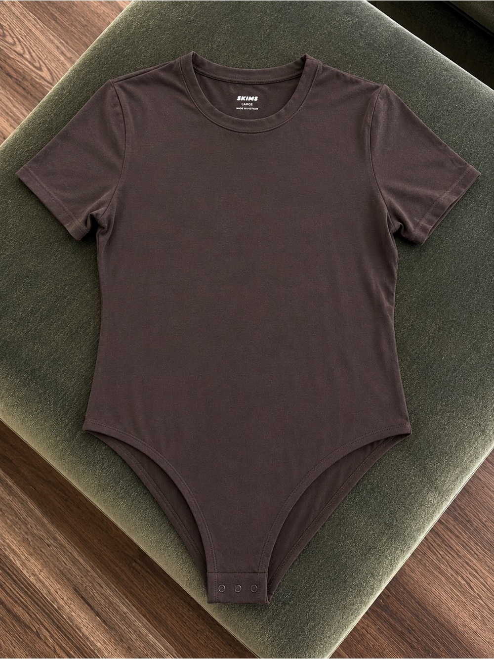 SKIMS  Short Sleeve One-Piece Bodysuit in Black